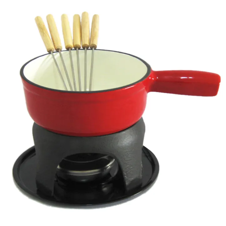 Red enameled cast iron fondue pot with forks and burner