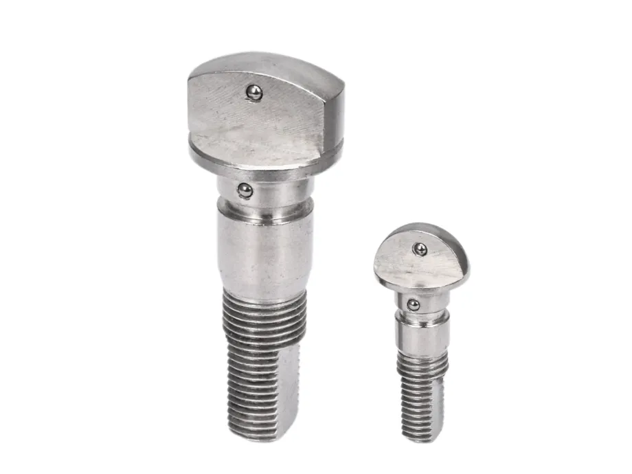 Two machined steel ball valve stems with threaded shafts