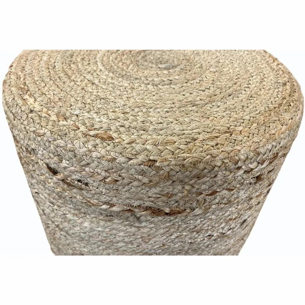 Round pouf covered in braided natural jute