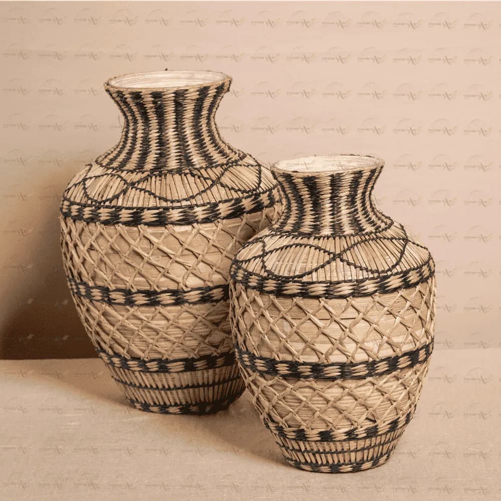 Two woven bamboo vases with black accents