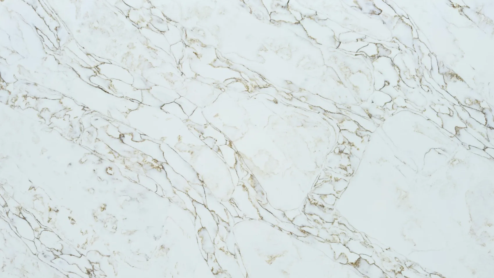 Close view of a white quartz slab surface with thin gold and gray veins