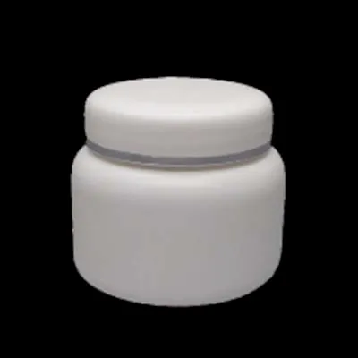 Squat plastic jar with a flat screw lid on a black background