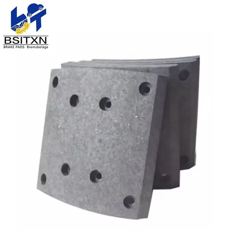 Stack of grey drilled brake lining blocks