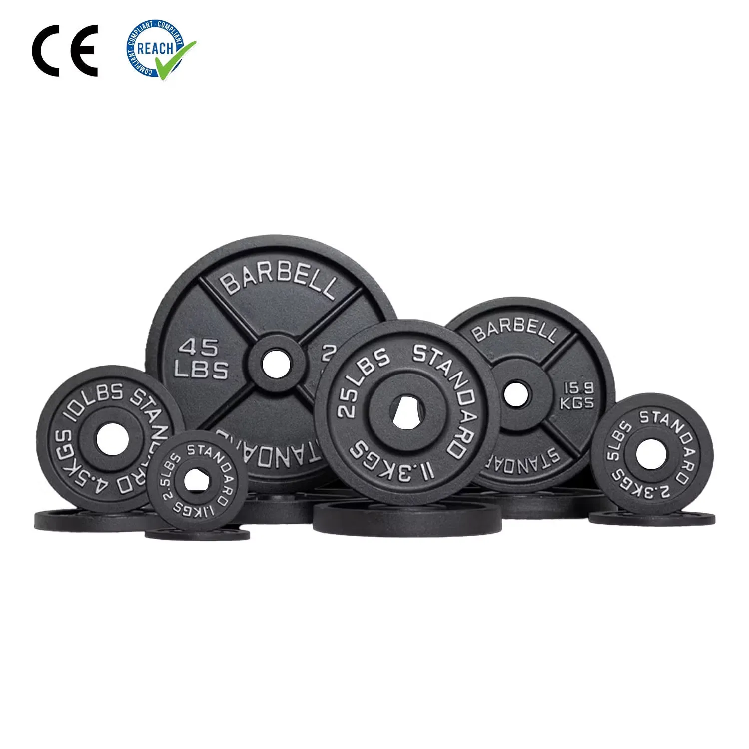 Stack of black barbell weight plates in several sizes