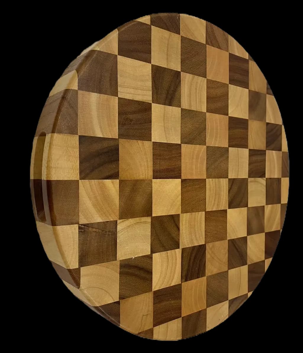 Round wooden cutting board with a checkerboard pattern