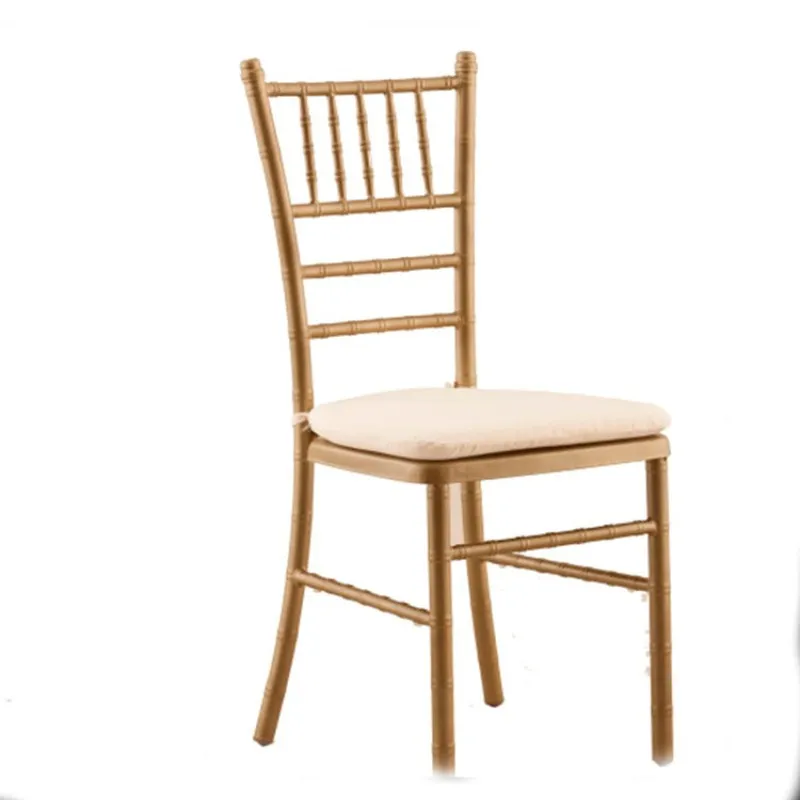 Gold chiavari chair with cream seat cushion
