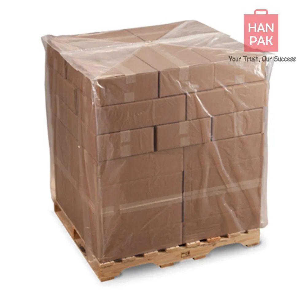 Clear plastic cover over a stack of cartons on a wooden pallet