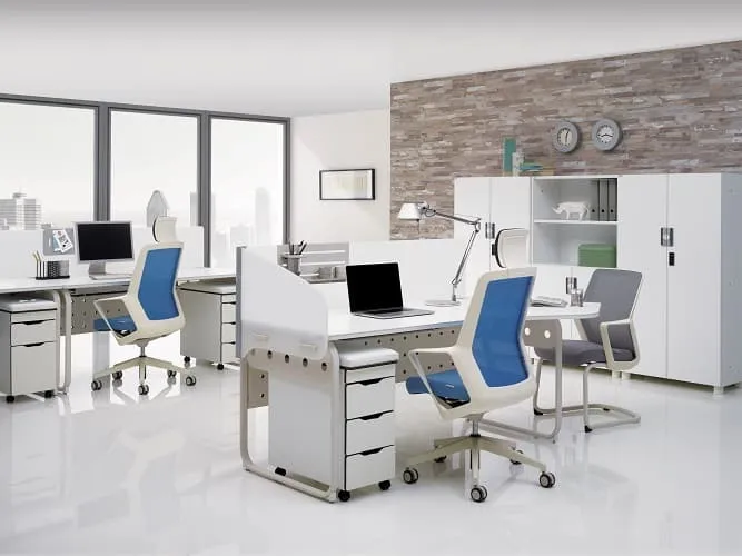 Open office with white PACE desks, blue task chairs and mobile pedestals